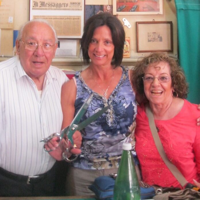 A visitor tries out Signor Trabalza’s heavy scissors