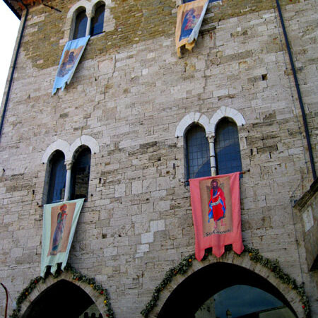 Medieval city hall with the four Gaite banners